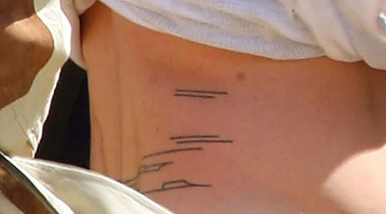 Close up of  Brad Pitt's tattoo