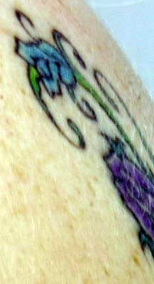 Chandra West tattoo close up