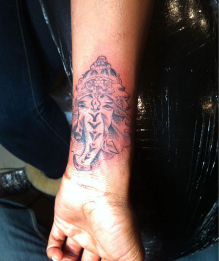 Brandy Norwood tattoo Ganesh