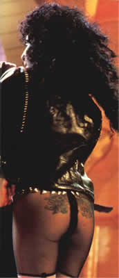 Cher's black rose ankle tattoo