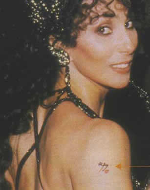 Cher's Chinese symbol for strength tattoo