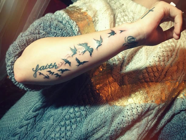 Demi Lovato birds arm tattoo