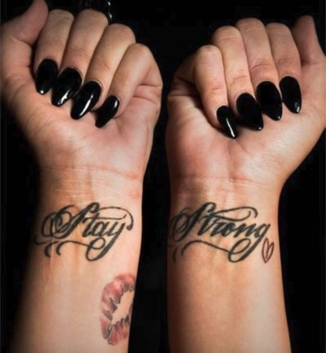 Demi Lovato stay strong arm tattoos