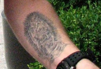 Kiefer Sutherland arm tattoo