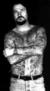 The Vanishing Tattoo's Thomas Lockhart proudly displays his full-body ink