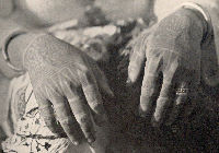Dayak woman's hand tattoos
