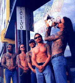 Thomas Lockhart in front of his Westcoast Tattoo studio. (Rat Dog is second from the right)