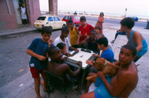 A friendly game of dominos on the Malecón.