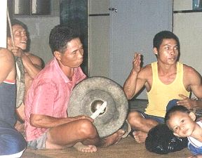 Traditional gongs and drums are played  for the war dance