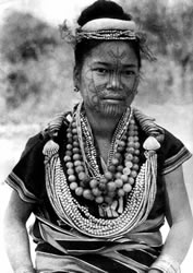 Northern Chin woman of the Chinbok tribe, Myanmar, ca. 1930. 