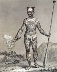 Tattooed chief of Nukuhiva with mata komoe pattern tattooed on his thighs.