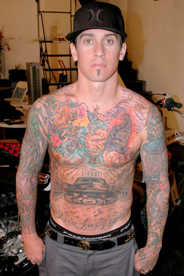 Motocross star Carey Hart unveils his new PETA promotional ad which  exposes the cruelty of the fur trade by showing off his amply tattooed  body next to the tagline Ink Not Mink