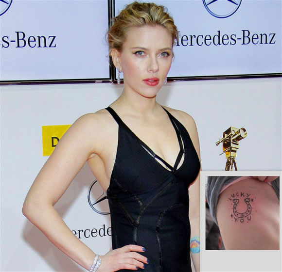 Scarlett Johansson  Scarlett Johansson Tattoo  Ribcage Ink Reads Lucky  You But What Does It Mean  Contactmusiccom