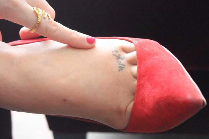 Laura Whitmore foot tattoo