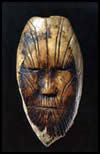 3500 year old ivory maskette from the Dorset culture. This sculpture represents the oldest known human portrait from the Arctic.