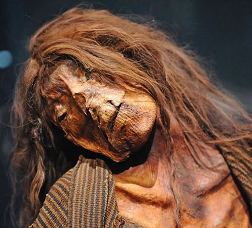 South American mummy with oval tattoo on her face